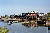 Tonle Sap - Kampong Phluk floating village - stilted houses 